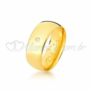Aliana com brilhante em ouro 18k - 750. Modelo tradicional de casamento.