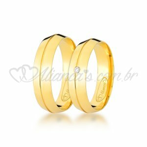 Par de alianas com brilhante em ouro 18k - 750