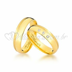 Par de alianas com brilhantes em ouro 18k - 750