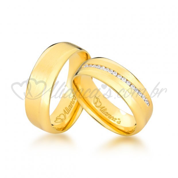 Par de alianas com brilhante de noivado e casamento em ouro 18k
