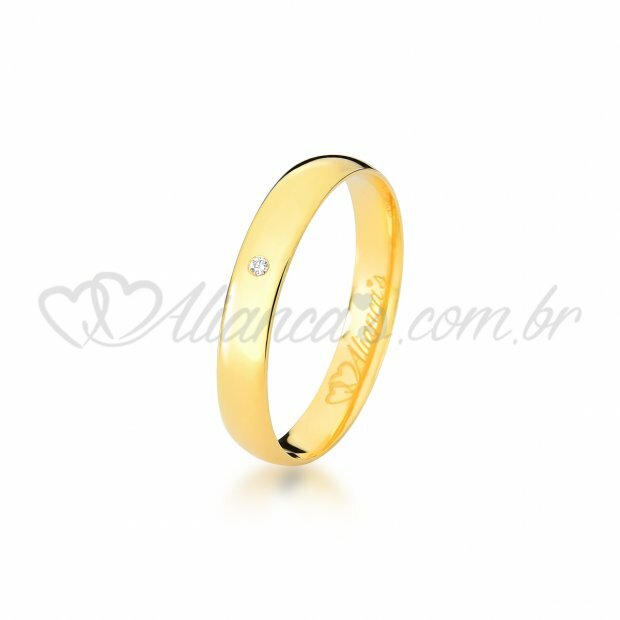 Alianas com brilhante em ouro 18k - 750. Modelo tradicional.