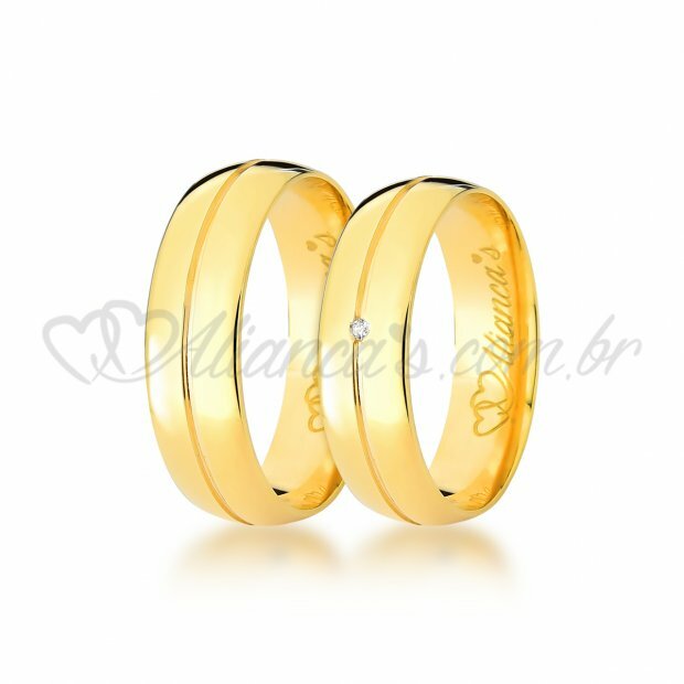 Par de alianas com brilhante, especiais para noivado e casamento, confeccionada em ouro 18k - 750