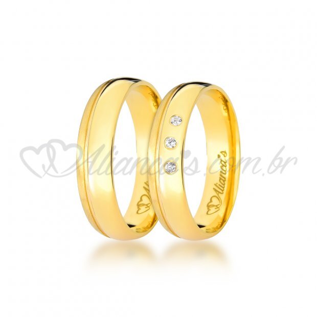 Par de alianas com brilhantes em ouro 18k - 750