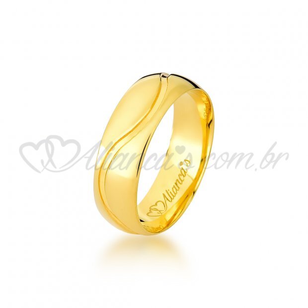 Par de alianas trabalhadas com brilhante em ouro 18k - 750. Ideal para noivado e casamento