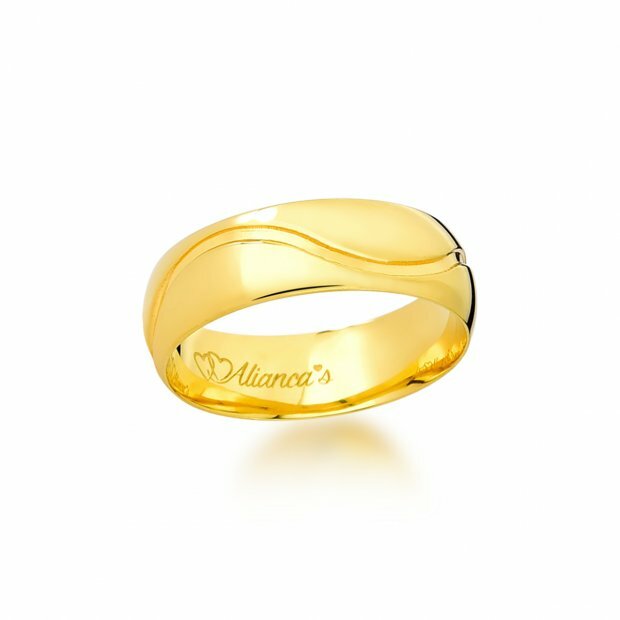 Par de alianas trabalhadas com brilhante em ouro 18k - 750. Ideal para noivado e casamento