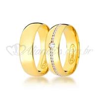 Par de alianças trabalhadas com brilhante em ouro amarelo 18k
