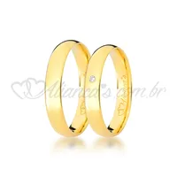 Par de alianças com brilhante em ouro amarelo 18k perfeitas para casamento e noivado.