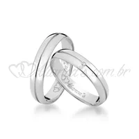 Par de alianças de casamento com brilhantes  em ouro branco  18k - Acabamento liso e polido com frisos.