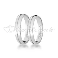 Par de alianças de casamento com brilhantes  em ouro branco  18k - Acabamento liso e polido com frisos.