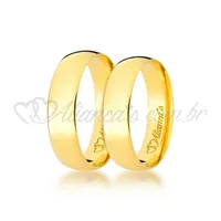 Par de aliança tradicional de casamento em ouro 18k. Acabamento liso e polido.